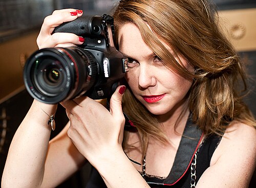 Erika Lust holding a camera